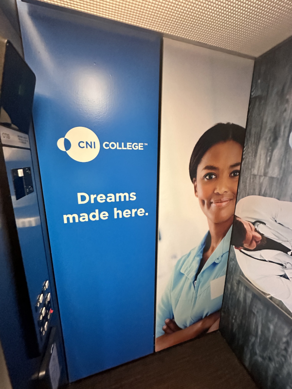 A poster in the CNI campus expansion that says Dreams made here
