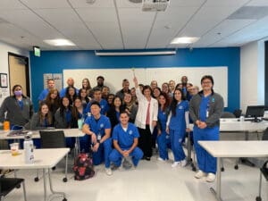 A group of CNI students in a classroom.
